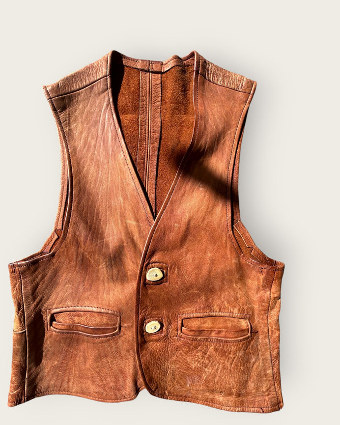 Beautifully aged 1930s buckskin vest with antler buttons