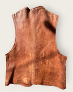 Beautifully aged 1930s buckskin vest with antler buttons